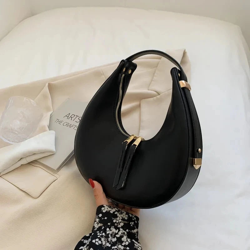 Bolso medio luna de lujo