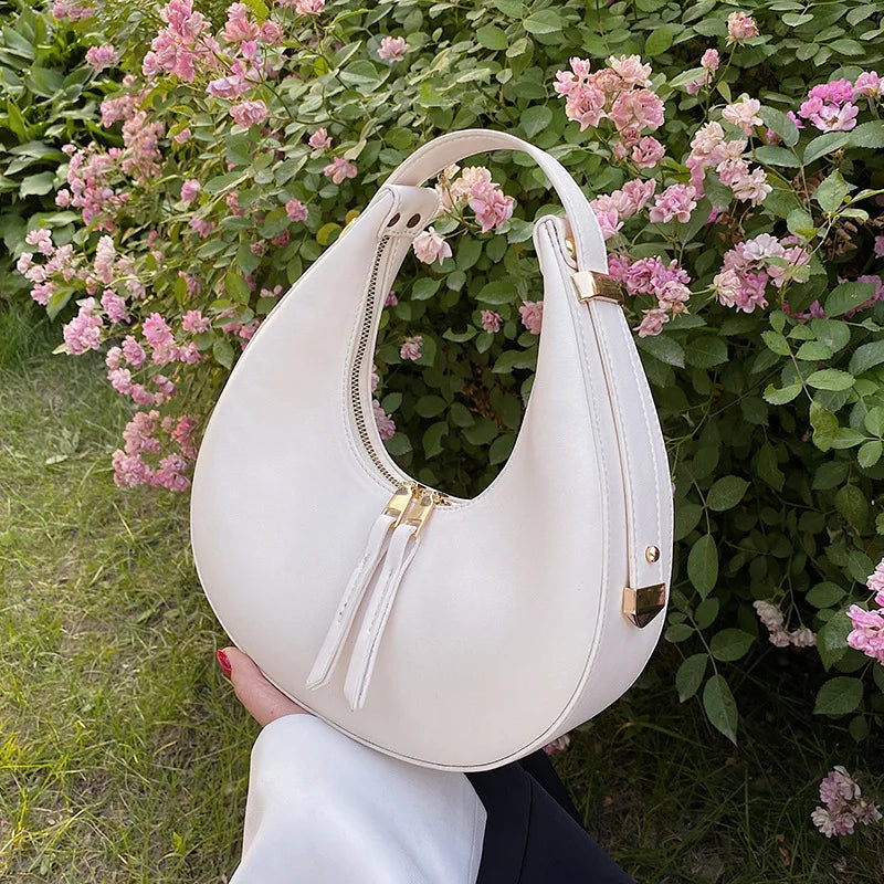 Bolso medio luna de lujo