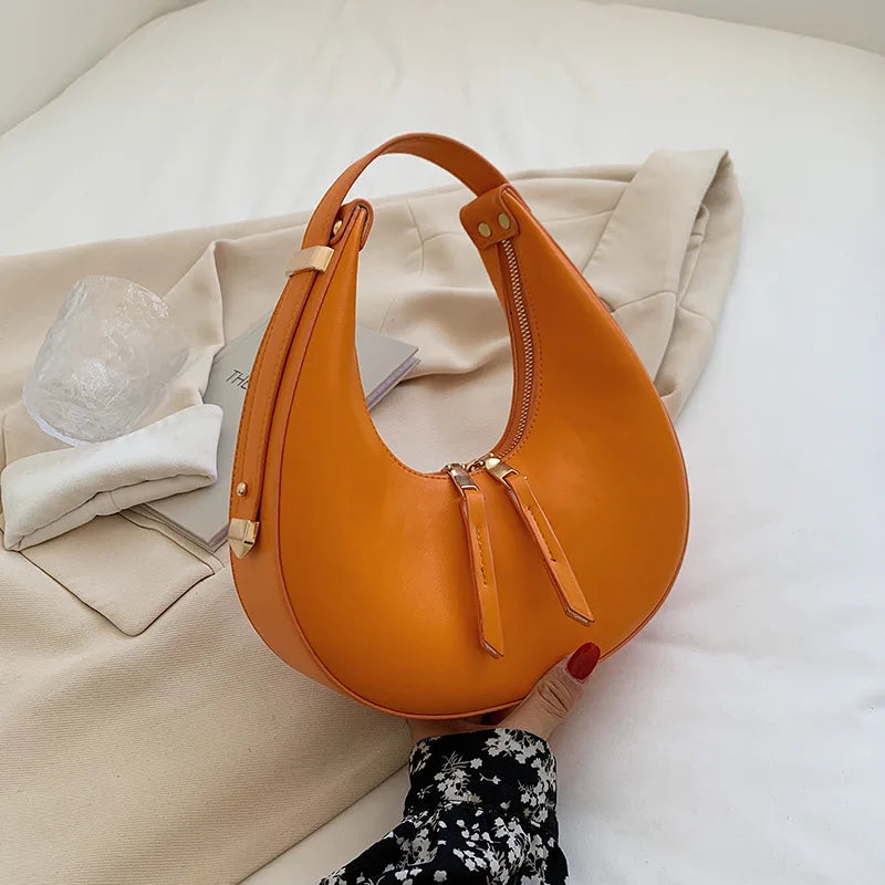 Bolso medio luna de lujo
